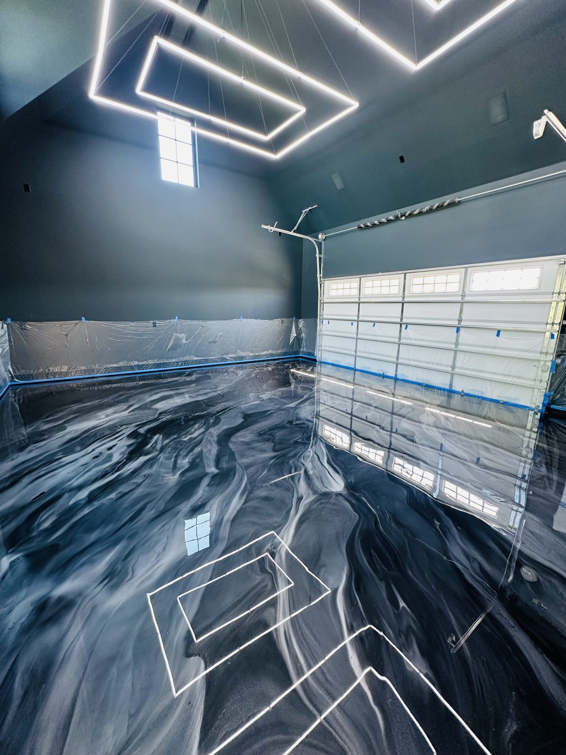 Deep metallic epoxy floor with high gloss reflection